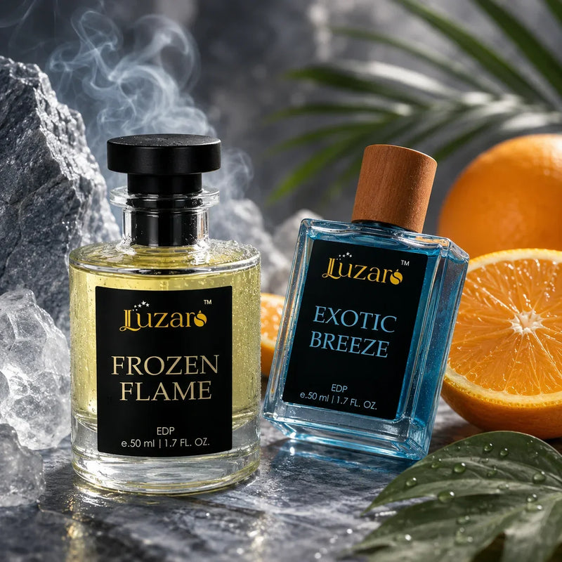 Luzaro Frozen Flame and Exotic Breeze perfumes displayed with ice, mist, oranges, and fresh greenery in a cool, refreshing setting.